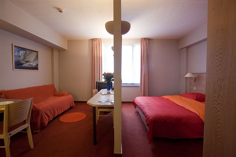 Aparthotel Axl Flathotel Continental Stay Иксел Екстериор снимка