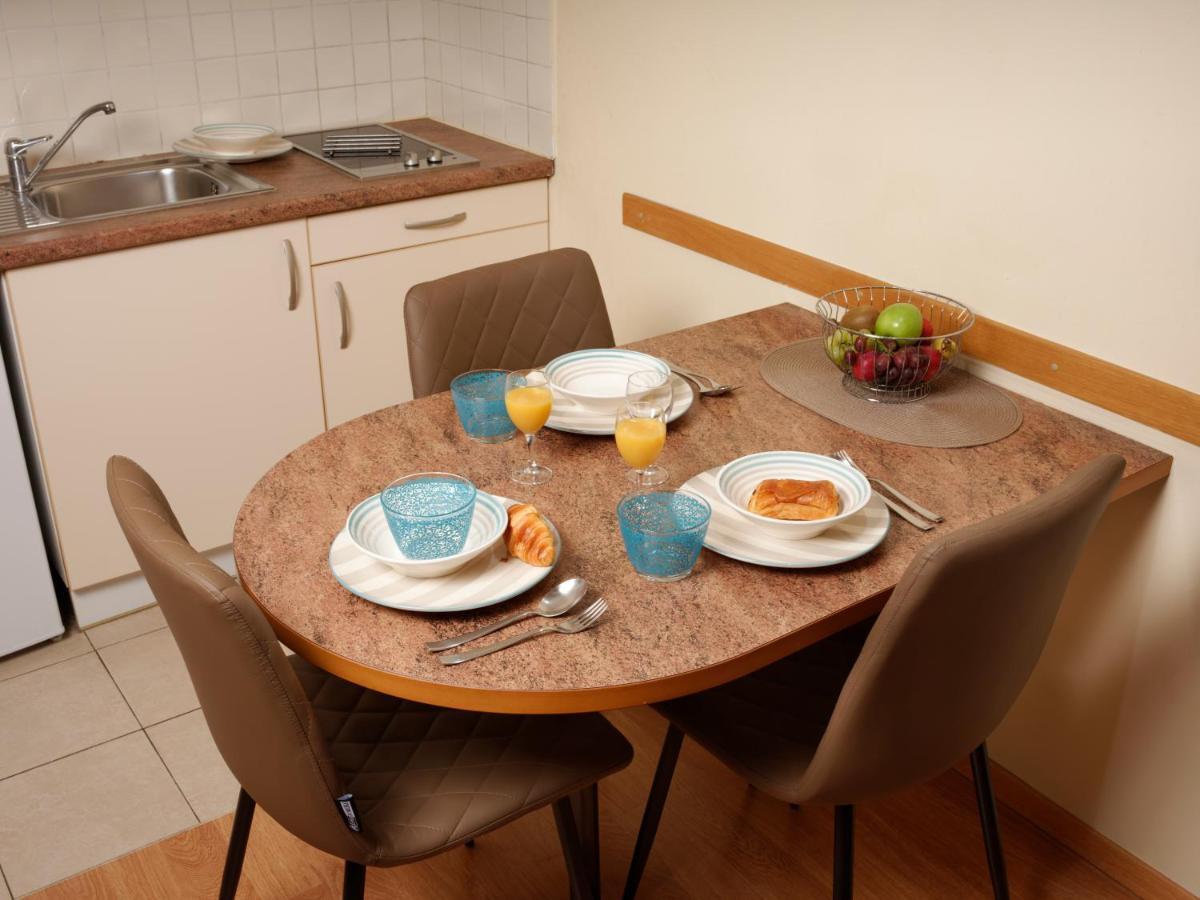 Aparthotel Axl Flathotel Continental Stay Иксел Екстериор снимка